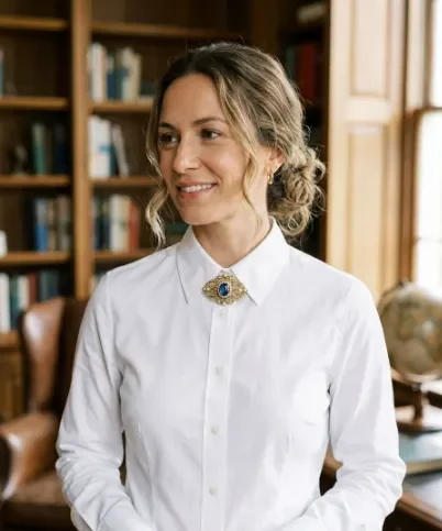 Brooch and White Button-Down Shirt